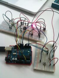 Picture of Stephanie and Julia's wired Arduino board. One section lights up.