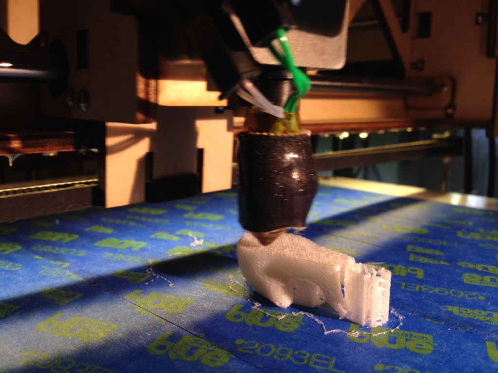 Image of a 3D printer at work creating a 3D bunny